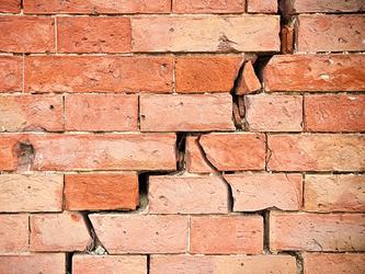 Cracked brick wall